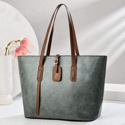 Refined Whisper Handbag